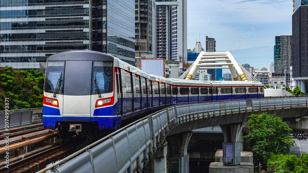 Fototapeta premium Close-up The Bangkok Mass Transit System (BTS) is serving the public, tourists, and commuters through the city center, representing Bangkok's public rail transport system in Thailand.