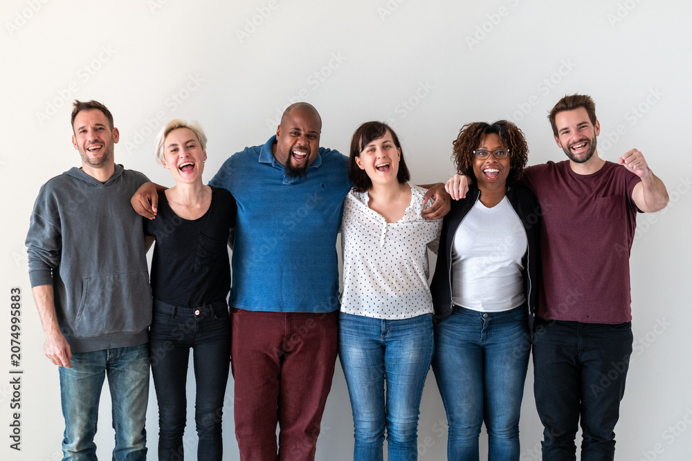 Obraz premium Diverse group of six people smiling and standing together.