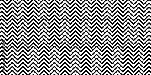 Black and white seamless chevron zigzag pattern background, modern geometric textile design, repeating monochrome abstract texture with bold graphic style.