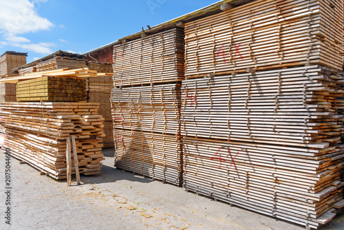 Industrial Timber Storage and Wooden Planks at a Sawmill in Germany