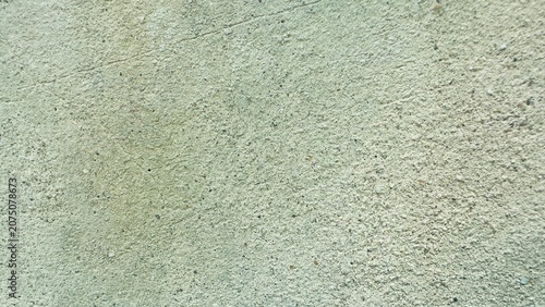 Photos Raw unfinished concrete wall texture background with fine hairline cracks
