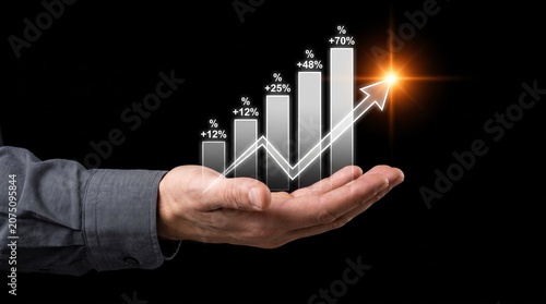 Professional hand holding digital growth chart representing business success and financial progress with rising percentage metrics on black background