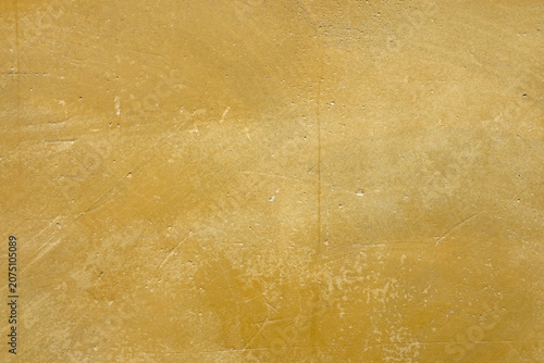 фотографія Mur chaulé peint en ocre jaune