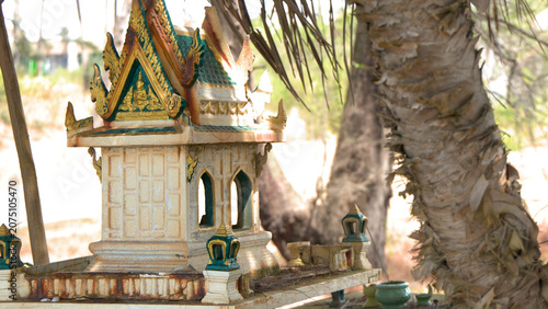 Cuadro en lienzo Traditional Thai Spirit House Shrine Under Palm Tree in Phuket