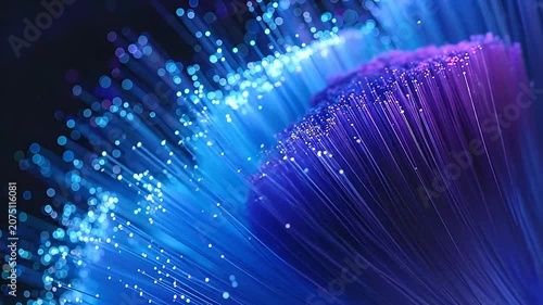 Abstract glowing fiber optic cables with vibrant blue light beams
