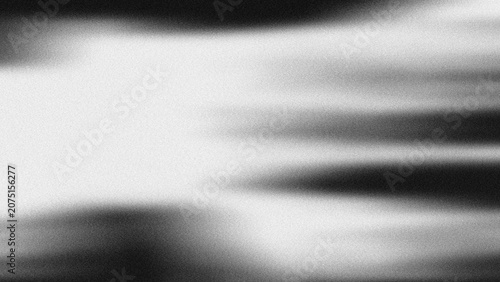 Abstract black and white gradient background with heavy noise grain, smooth horizontal motion blur transition, minimalist grainy texture backdrop