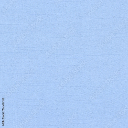 Fotografie Light blue textured fabric background with subtle lines