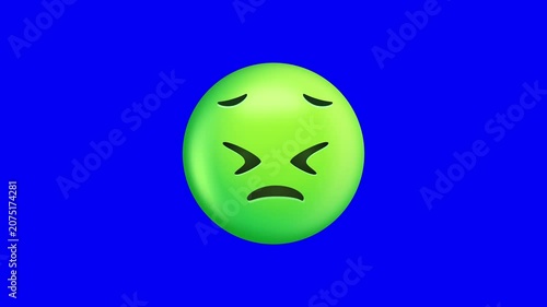 Green Nauseated Emoji On Blue Background.