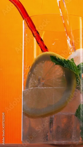 Close-up of Citrus Drink Being Poured