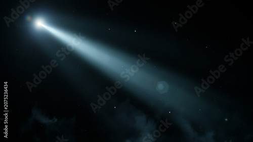 Bright Comet Streaking Across Dark Night Sky with Starry Background