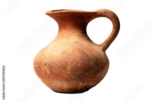 Rustic ancient terracotta clay jug with single handle for traditional home decor and historical artifact display on transparent background