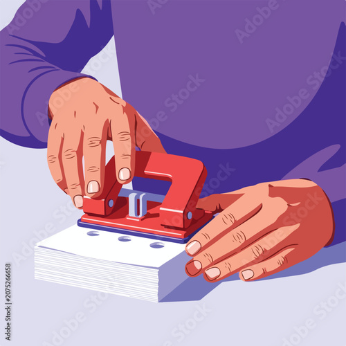 Hands punching holes in paper stack with a red office tool