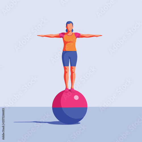 Person balancing on a large stability ball in a studio