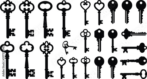 Foto Collection of various black keys on white background, including skeleton, heart,