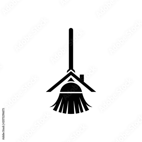 Broom with house shaped handle.