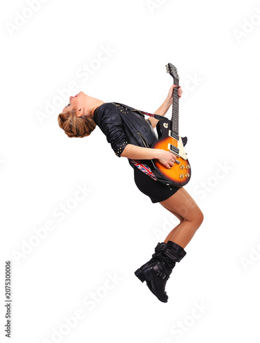 Woman playing electric guitar.