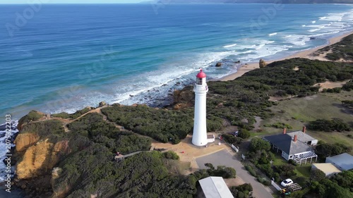 Aerial view Aireys Inlet Lighthouse Australia. Beautiful nature landscape lighthouse on top of a cliff, travel and tourism on the southern ocean coast in Victoria.