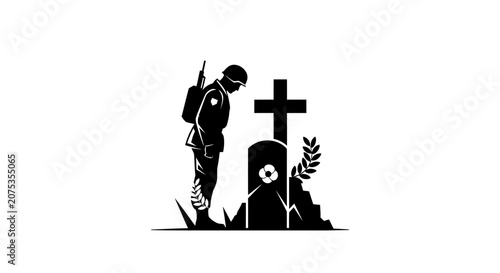 Silhouette of a grieving soldier standing before a grave marker with a cross.