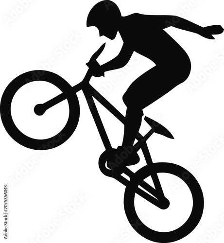 Foto Cyclist silhouette doing a wheelie stunt on a bmx mountain bike black and white