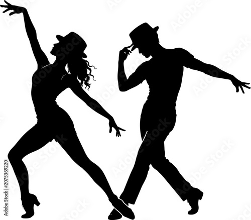 Couple performing energetic tango dance moves in studio with dramatic arm gestures