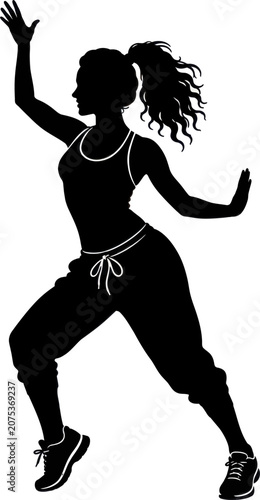 Woman dancing energetically with raised arm and flowing hair in casual outfit