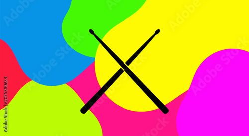 Two crossed black drumsticks isolated on a vibrant multi colored background.
