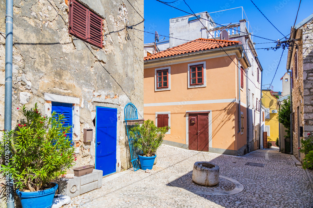Fototapeta premium Romantic old street in historic town of Novi Vinodolski, Kvarner, Croatia