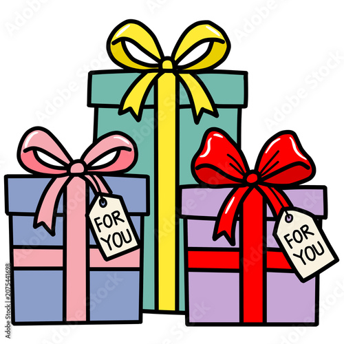 Cute gift boxes with colorful ribbons bows and tags for holiday celebrations