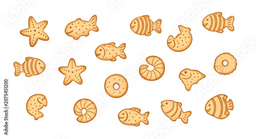 Variety of golden fish and sea creature shaped crackers including starfish and rings are spread out on a clean white background for a snack.