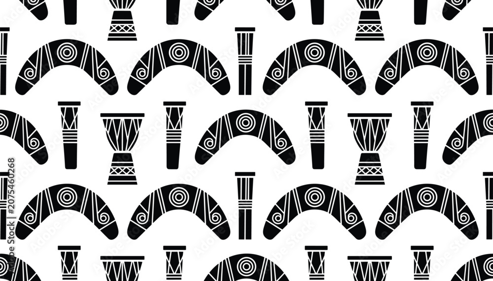 Naklejka premium Seamless pattern of traditional tribal items like boomerangs and drums in a monochrome black and white minimalist graphic style.
