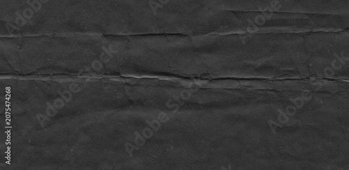 Принти на полотні Dark paper texture with natural folded surface, subtle fiber texture and soft tonal variation in panoramic format
