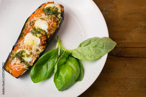 Photos Gourmet stuffed baked cannelloni on white plate