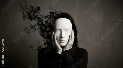 Fake People Concept with Woman Holding Mask and Black Smoke