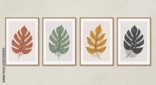 Modern Botanical Prints Set with Stylized Monstera Leaves in Earthy Tones and Wooden Frames on a Light Beige Wall.
