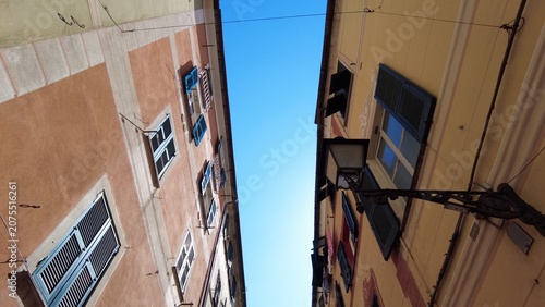 Europe, Italy , Liguria, 06,27,2026   Santa Margherita Ligure close to Portofino is a colorfull sea village tourist attraction destination for summer holidays - typical colorful houses with sky 