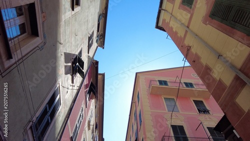 Europe, Italy , Liguria, 06,27,2026   Santa Margherita Ligure close to Portofino is a colorfull sea village tourist attraction destination for summer holidays - typical colorful houses with sky 
