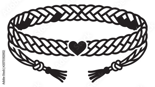 Foto Intricate braided friendship bracelet featuring heart design and tassels on tran