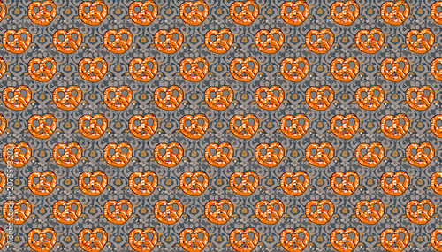 Fotografia Seamless repeating pattern of orange pretzels on a textured grey background, creating a decorative and appetizing design