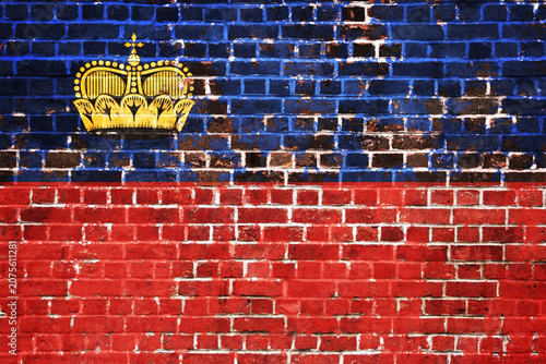 Tableau sur toile Weathered Flag of Liechtenstein Painted on an Old Brick Wall with a Distinctive