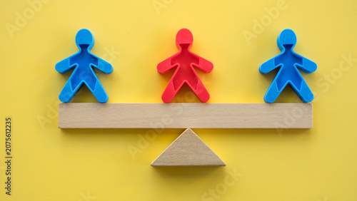 Fotografie Corporate arbitrage and mediator concept featuring a red figure balancing two bl
