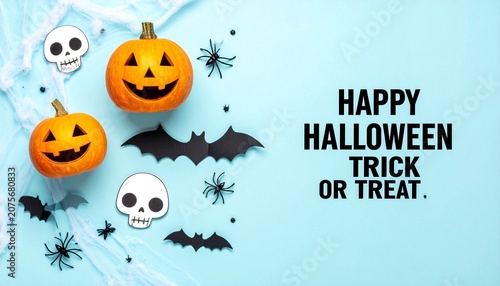 Happy Halloween design with pumpkins, skulls, bats, and festive light blue spooky background