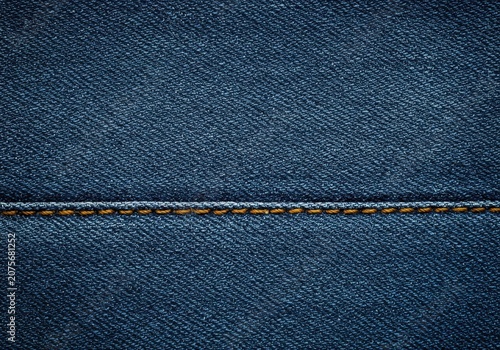 Close up of classic indigo blue denim fabric texture showing the diagonal weave and sturdy stitched seam detail, material, diagonal, clothing