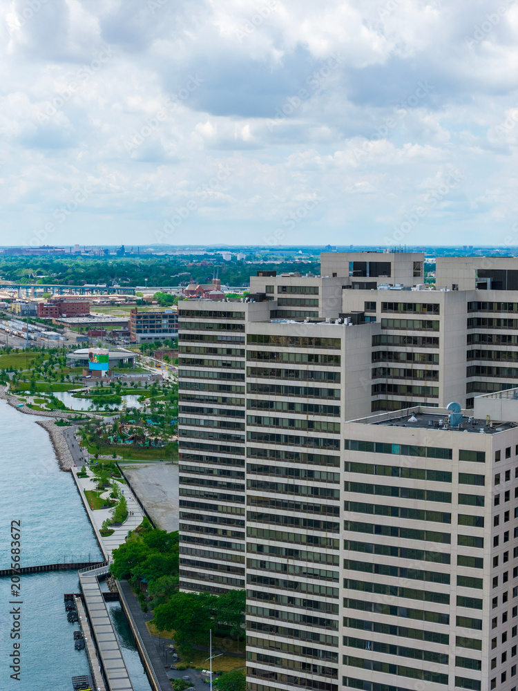 Fototapeta premium Aerial shot of Skyscrapers and office buildings in the skyline in Detroit Michigan USA