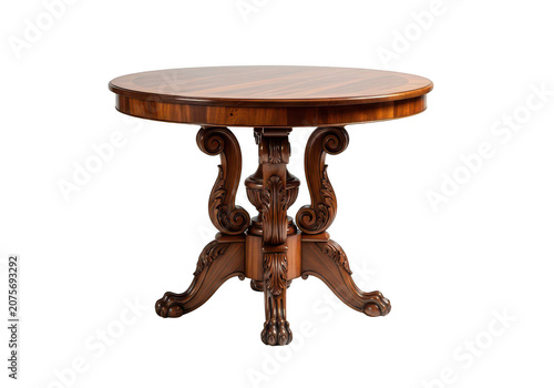 Antique round wooden table with carved pedestal base.