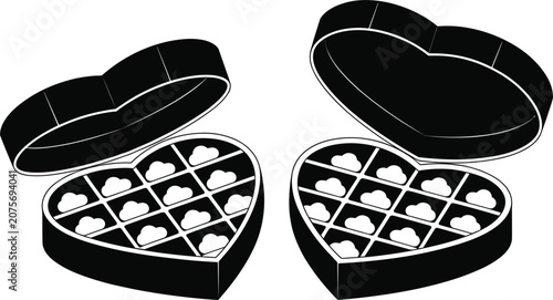 Konstfotografi Two heart-shaped open boxes filled with assorted chocolates, black and white hea
