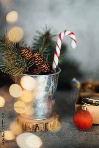 Charming Christmas composition with candy cane inspires warm festive nostalgia ideal for seasonal holiday home decor marketing or retail advertising.