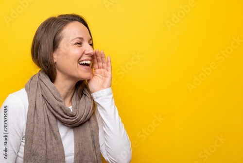 Woman Shouting Announcement Yellow Background