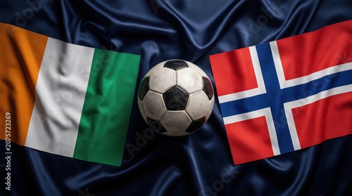 Soccer ball between the flags of ivory coast and norway
