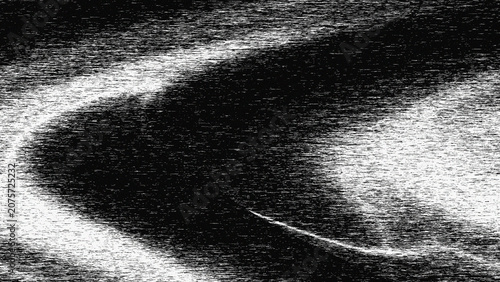 Abstract black and white swirling pattern.