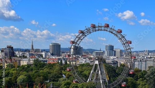 Фотография Vienna Giant Ferris Wheel (Riesenrad) and City Skyline under Blue Sky – Famous L
